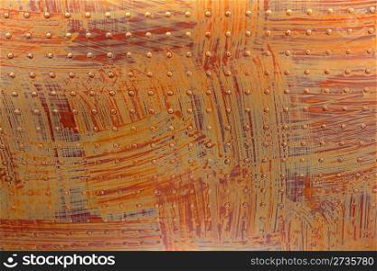 Orange metallic surface in rivets