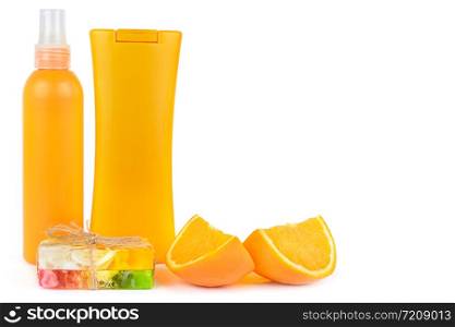 Orange natural cosmetic products: gel, lotion, serum and handmade soap. Vials isolated on white background. Face and body skin care. Free space for text.
