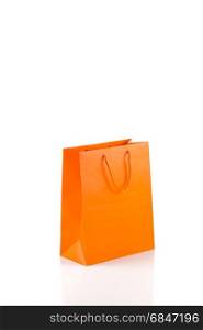 Orange paper bag isolated on white Diagonal angle