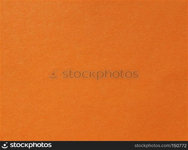 Orange paper texture useful as a background, soft pastel colour. Orange paper texture background