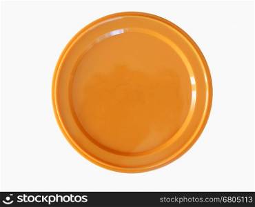 Orange plastic token money. Orange plastic chip fiche token money - isolated over white