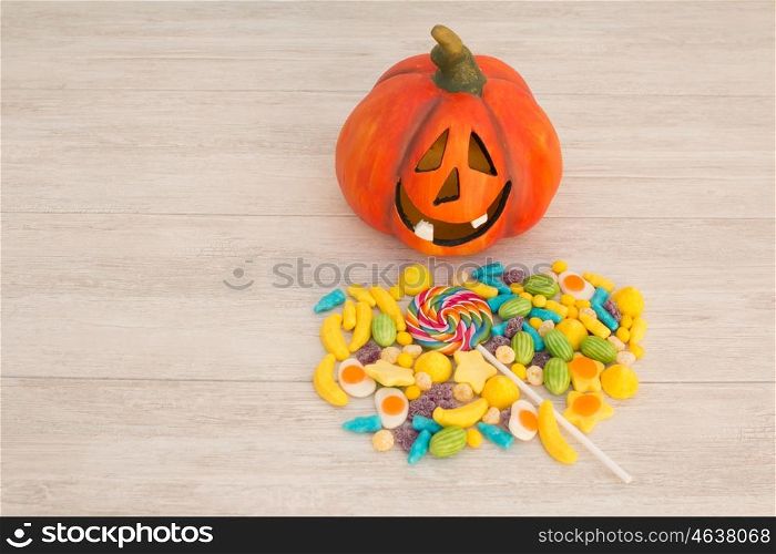 Orange pumpkin halloween with many baubles.