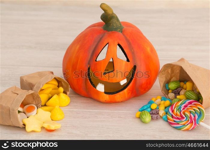 Orange pumpkin halloween with many baubles.