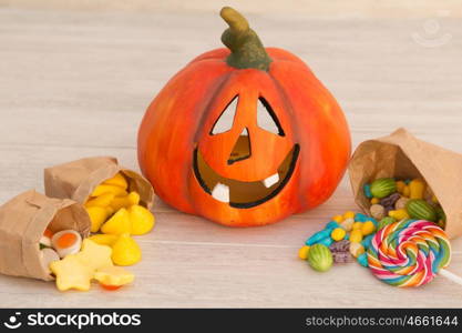 Orange pumpkin halloween with many baubles.