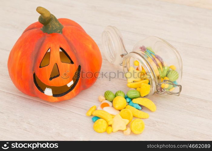 Orange pumpkin halloween with many baubles.