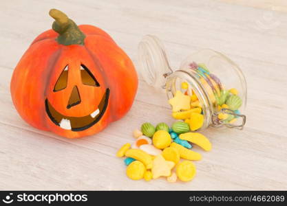 Orange pumpkin halloween with many baubles.