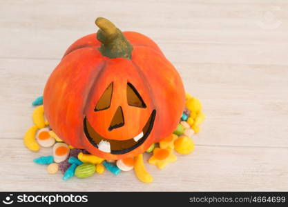 Orange pumpkin halloween with many baubles.