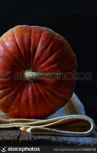 Orange Pumpkin isolated on old wood table