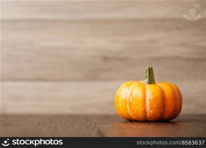 Orange pumpkin on table with copy space for banner background. Happy Halloween day, Hello October, fall autumn season, Festive, party and holiday concept