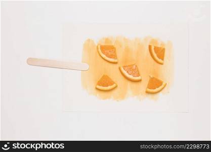 orange quarters ice cream stick watercolor splash