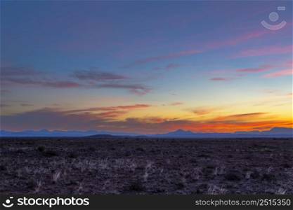 Orange red and pink clouds after sunset Karoo South Africa