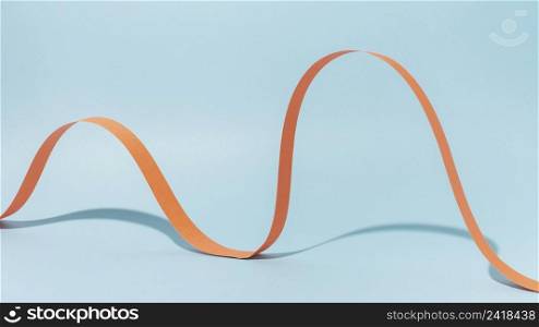 orange ribbon with blue background