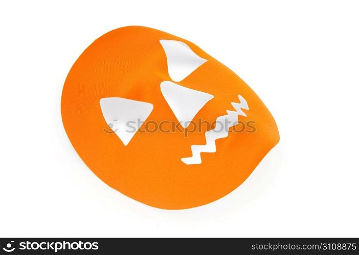 Orange scary halloween mask as holiday concept