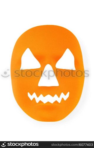 Orange scary halloween mask as holiday concept