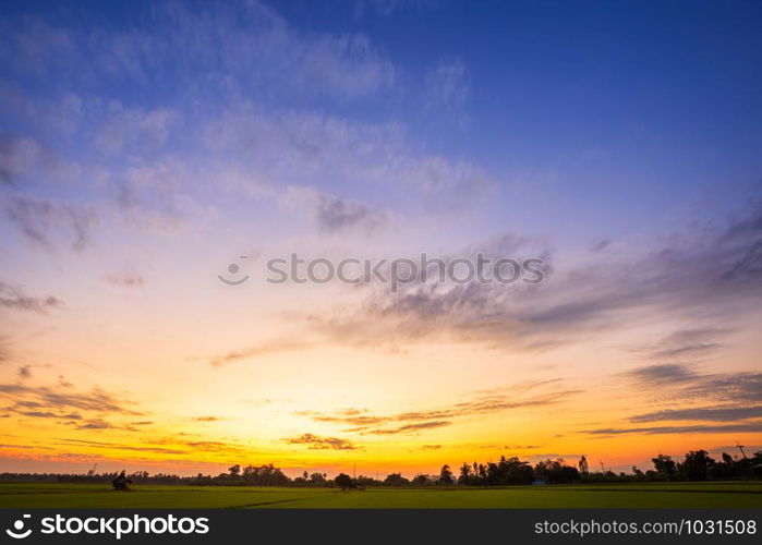 Orange sky background texture with white clouds sunset.