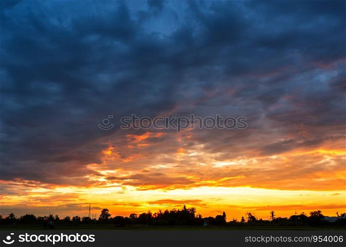Orange sky background texture with white clouds sunset.