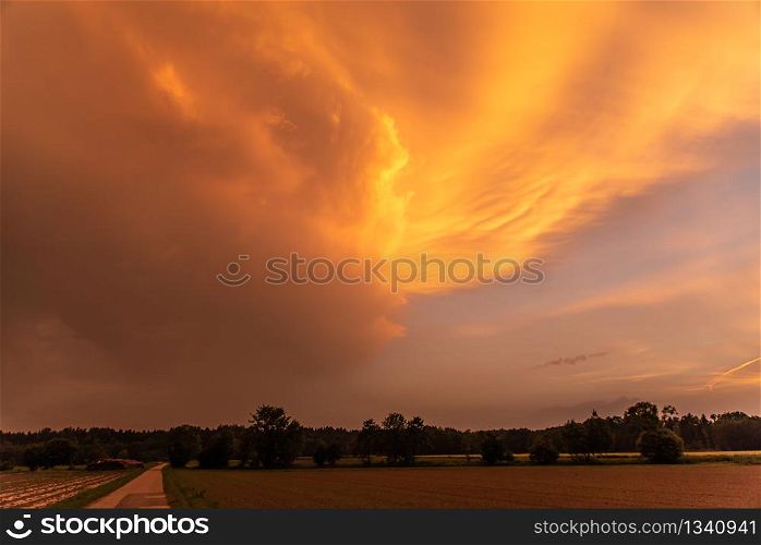 Orange sky during sahara dust storm in Europe over rural area. Orange sky during sahara dust storm in Europe