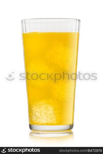 Orange soda soft drink with ice cubes and bubbles on white.