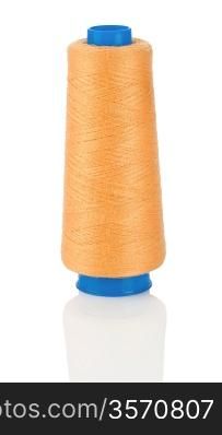 orange thread on blue Spool