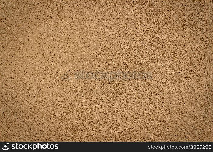 Orange wall background and texture with vignetting and blank copyspace for text or advertising.