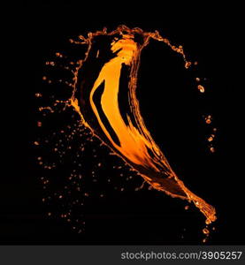 orange water splash isolated on black