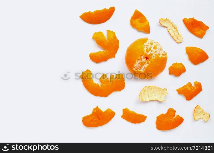 Orange with peel on white background. Copy space