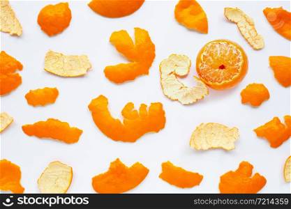 Orange with peel on white background. Top view