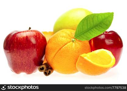 oranges, cinnamon sticks and apples isolated on white