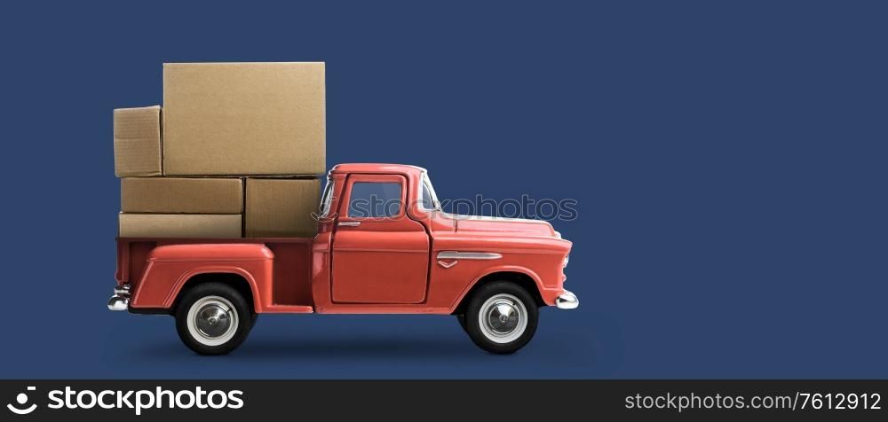 Order delivery. Car delivering blank boxes. Loaded red pickup truck on blue background. Car delivering order