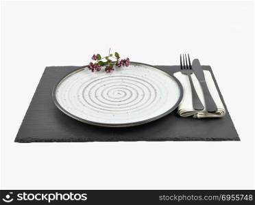 Oregano and table setting on slate isolated
