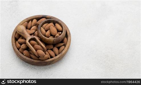 organic almond nuts bowl copy space. High resolution photo. organic almond nuts bowl copy space. High quality photo