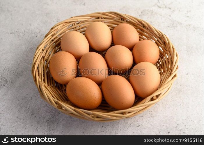 Organic brown eggs several in a wicker basket, preparing preparing for cooking food or dessert