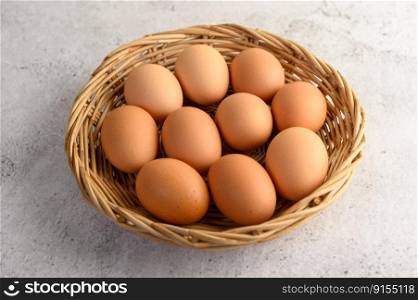 Organic brown eggs several in a wicker basket, preparing preparing for cooking food or dessert