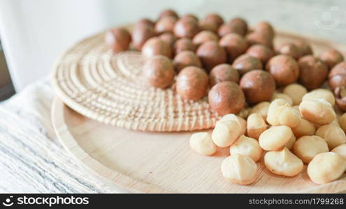 Organic Macadamia nut. macadamia nuts are cracked and baked to taste extremely delicious superfood fresh natural shelled macadamia and healthy food concept
