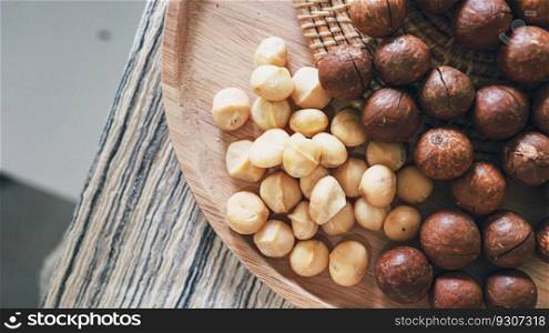 Organic Macadamia nut. macadamia nuts are cracked and baked to taste extremely delicious superfood fresh natural shelled macadamia and healthy food concept