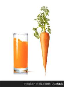 Organic natural vertical carrot fruit with green leaf and glass of the same juice on a white background, copy space. Vegan concept.. Juice glass with fresh organic carrot vegetable.