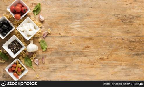 organic raw ingredients with conchiglie pasta brown desk . Resolution and high quality beautiful photo. organic raw ingredients with conchiglie pasta brown desk . High quality and resolution beautiful photo concept