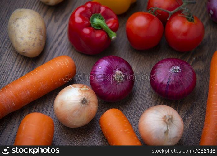 Organic vegetables for cooking on wooden floors