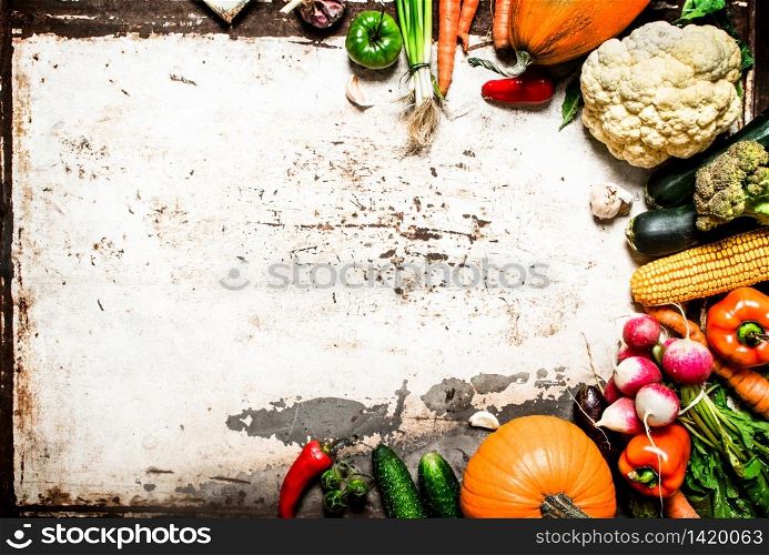 Organic vegetables. Natural vegetables and herbs. On rustic background .. Natural vegetables and herbs.