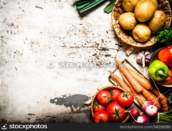 Organic vegetables. Natural vegetables and herbs. On rustic background .. Natural vegetables and herbs.