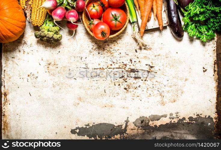 Organic vegetables. Natural vegetables and herbs. On rustic background .. Natural vegetables and herbs.