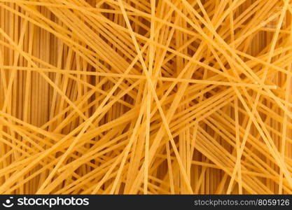 Organic whole wheat spaghetti pasta for background