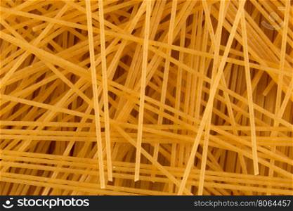 Organic whole wheat spaghetti pasta for background
