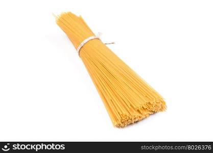 Organic whole wheat spaghetti pasta on white background