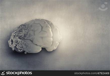 Organization ability. Model of human brain and cogwheel mechanism