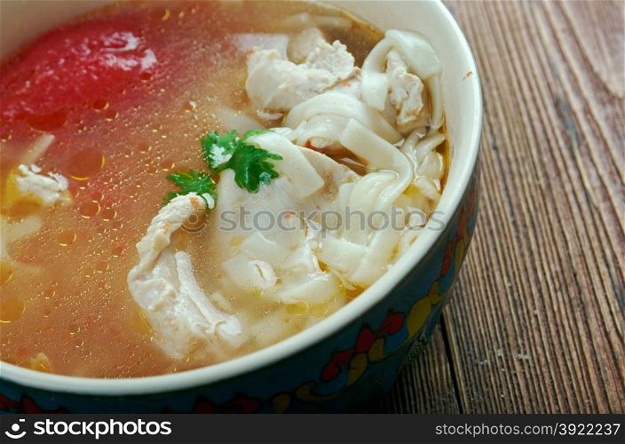Oriental chicken soup tovuk shourpa .Uzbek cuisine
