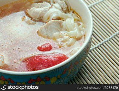 Oriental chicken soup tovuk shourpa .Uzbek cuisine