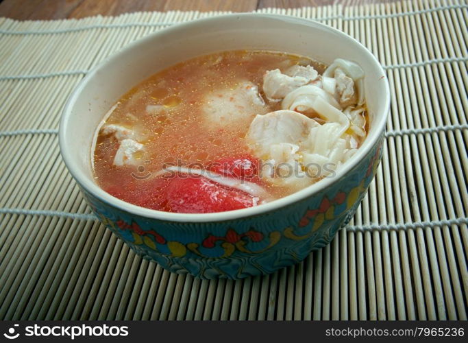 Oriental chicken soup tovuk shourpa .Uzbek cuisine