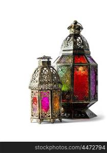 Oriental colorful light lantern on white background. Arabic holidays decoration