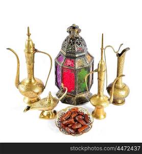 Oriental holidays decoration lantern, pots, dishes. Islamic hospitality concept. Ramadan kareem
